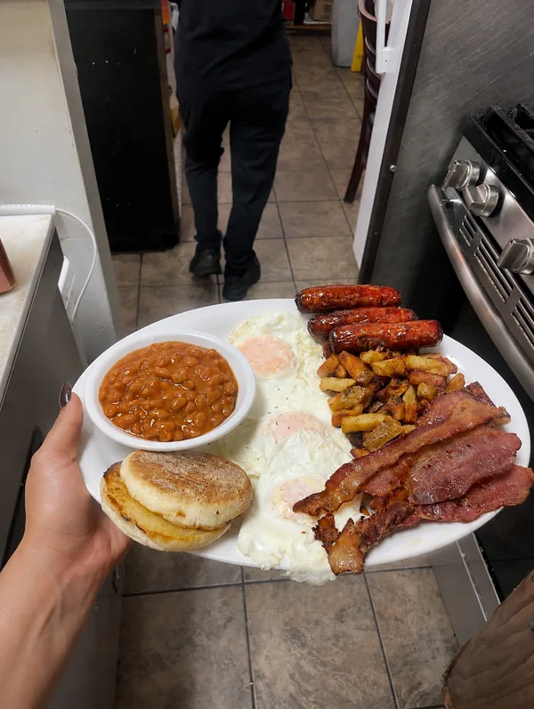 Eggs, breakfast meats, beans and home fries